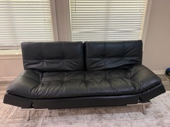 Black Faux Leather Tufted Futon Sofa Bed
