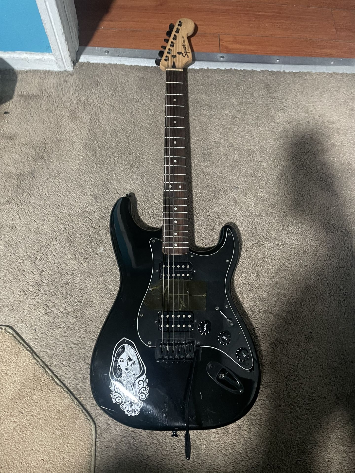 Squire Stratocaster with double Humbucker and whammy bar