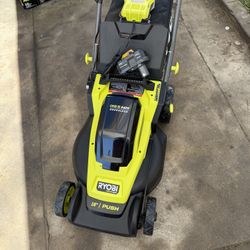 ONE+ HP 18V Brushless 16 in. Cordless Battery Walk Behind Push Lawn Mower with (1)4.0 Ah Batteries and (1) Charger by RYOBI