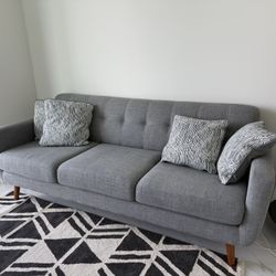 Light Gray Sofa With Pillows