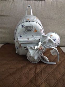 Loungefly Disney 100 Mini Backpack and Ears Headband SetIncludes the loungefly backpack
And ears
Both brand new with tags
Limited edition
Platinum cel