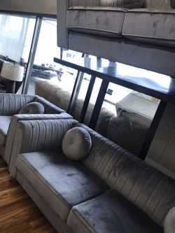 Grey nice couch and loveseat with chair