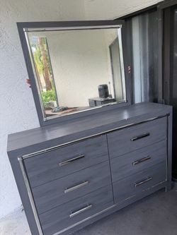Gray Dresser with Mirror and Chrome Handles