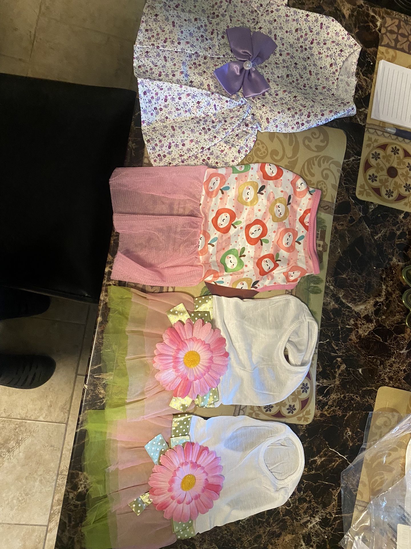 Assorted, medium and small dog dresses $10 Each