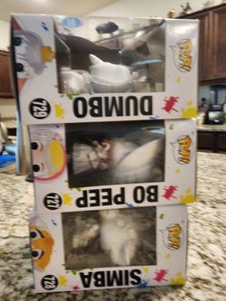Collectible Funko Pop figures. Disney set with Dumbo #729, Bo Peep #727, and Simba #728. All new in box. Dumbo has special edition sticker.