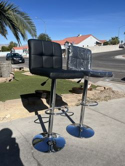 Brand New Set of 2 modern black leather swivel bar stools, height adjustable