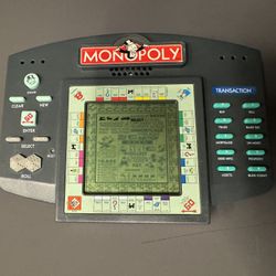 Monopoly 1997 Hasbro Electronic Handheld Game Parker Brothers