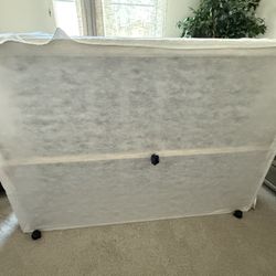 FULL SIZE BOX SPRING NEW WITH COVER AND WHEELS