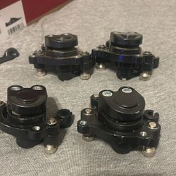 Four Black Minibike Brakes 