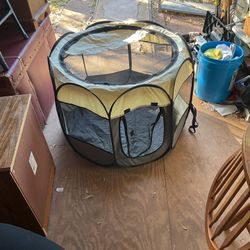 Pet pen 30 inches across it 23 inches tall