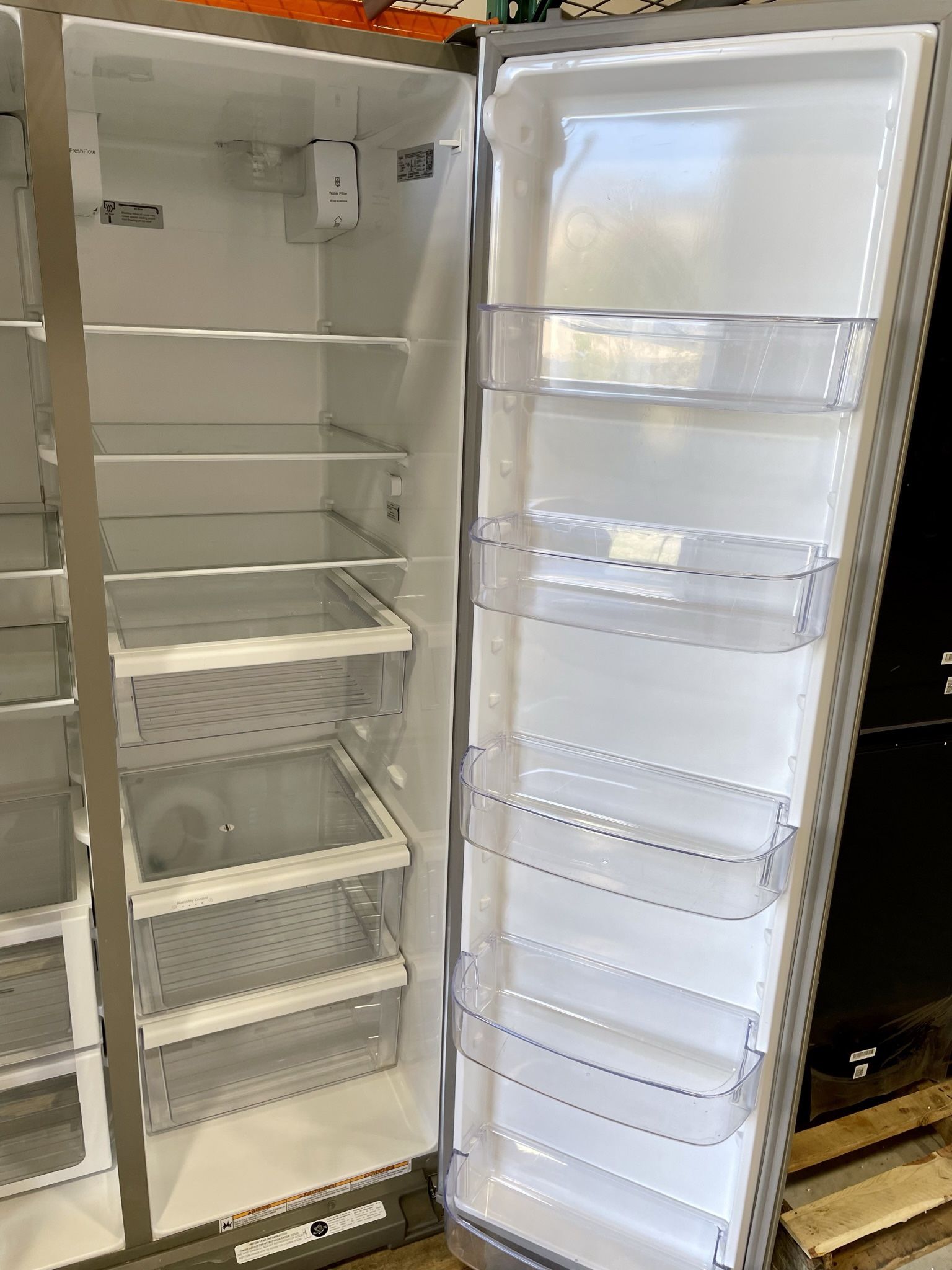 Whirlpool 28 cu. ft. SidebySide Refrigerator with Water Dispenser for