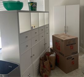 Two white cabinets