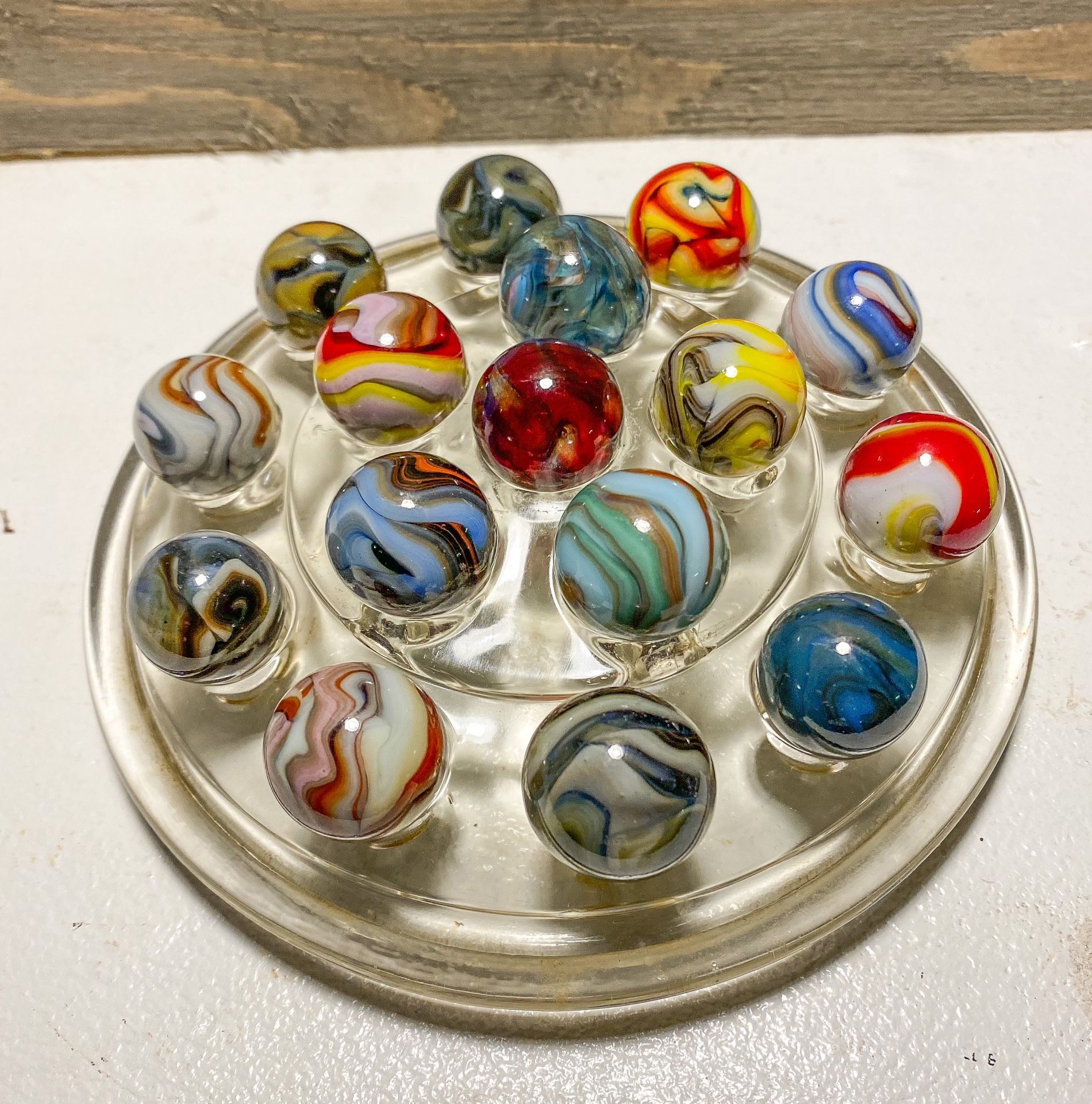 16 Jabo Marbles With A Glass Frogs Eye Stand