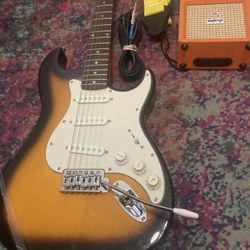 Silvertone Stratocaster Guitar Bundle W/ Amp, Strap Cord And Picks