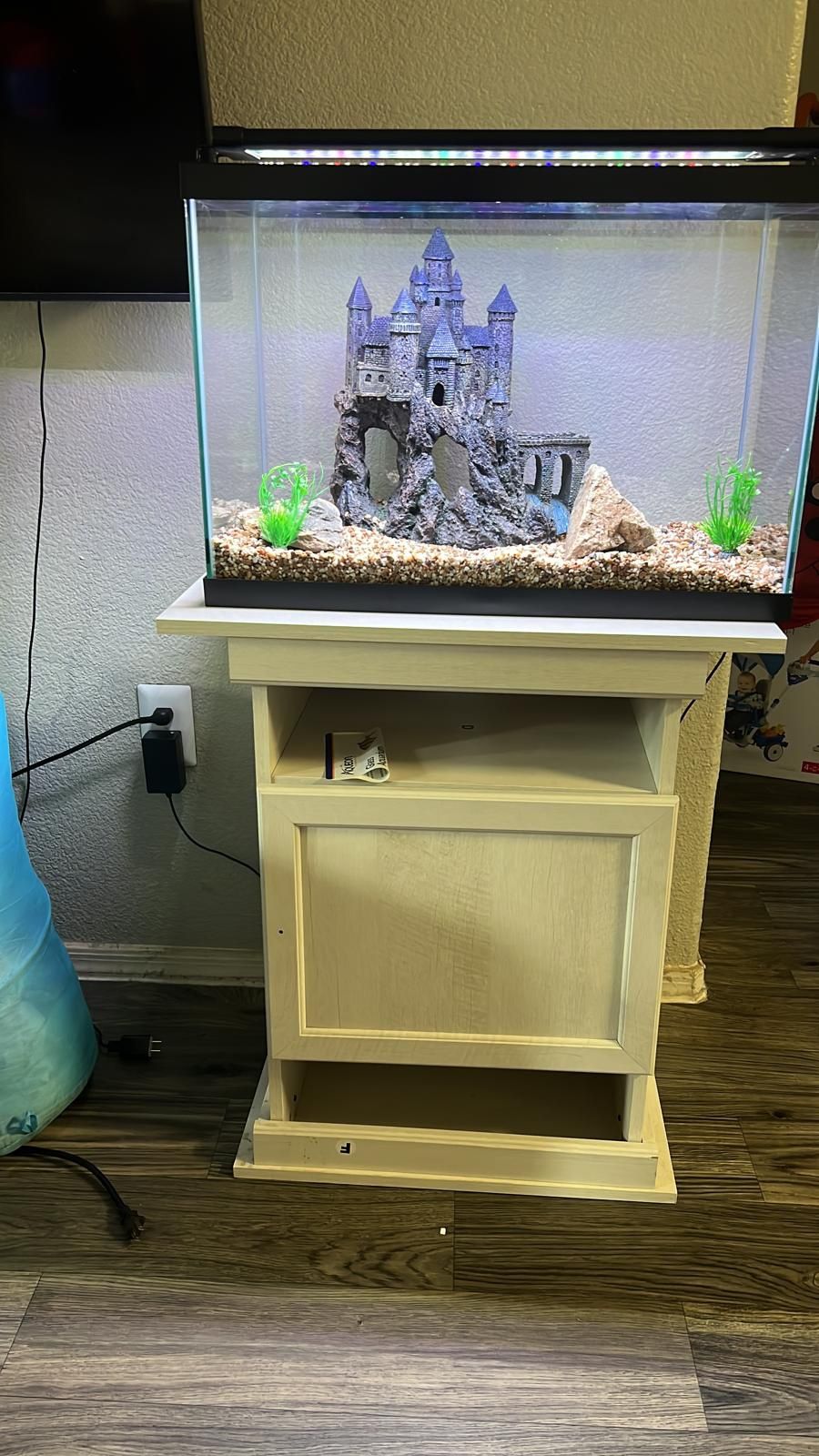 Fish Aquarium Fish aquarium includes castle, lights,power filter,Aquarium solution,food, bubble machine all included. Brand new air filter