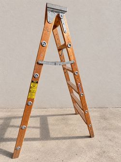 Johnson 6-Foot Wooden Stepladder – Steps on Both Sides – $35