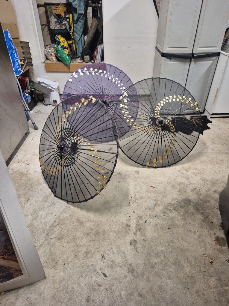 Three Sun Umbrellas