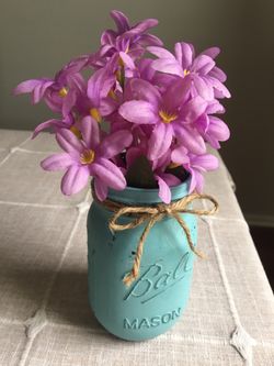 Distressed mason jar vase with silk flowers $5