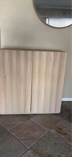 Light Wood Two-Door Storage Cabinet