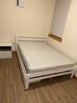 Full size matttess and wooden bed frame