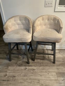 2 counter height 360 degree swiveling barstools