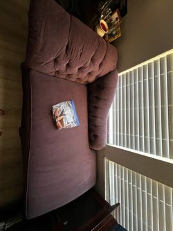 Purple tufted chaise lounge