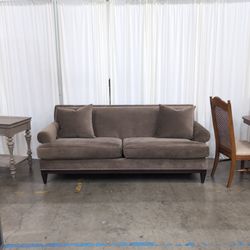 Taupe Fabric Two-Seat Couch with Nailhead Trim