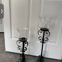 2 metal candlesticks, both for $30