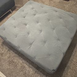 Large gray tufted ottoman