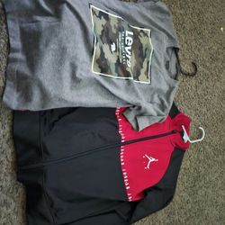 Assorted pants, shirts, sweaters, jackets and shoes