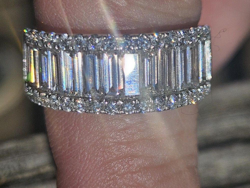 14k White Gold Ring With 3 Carats Of Baguette Diamonds.