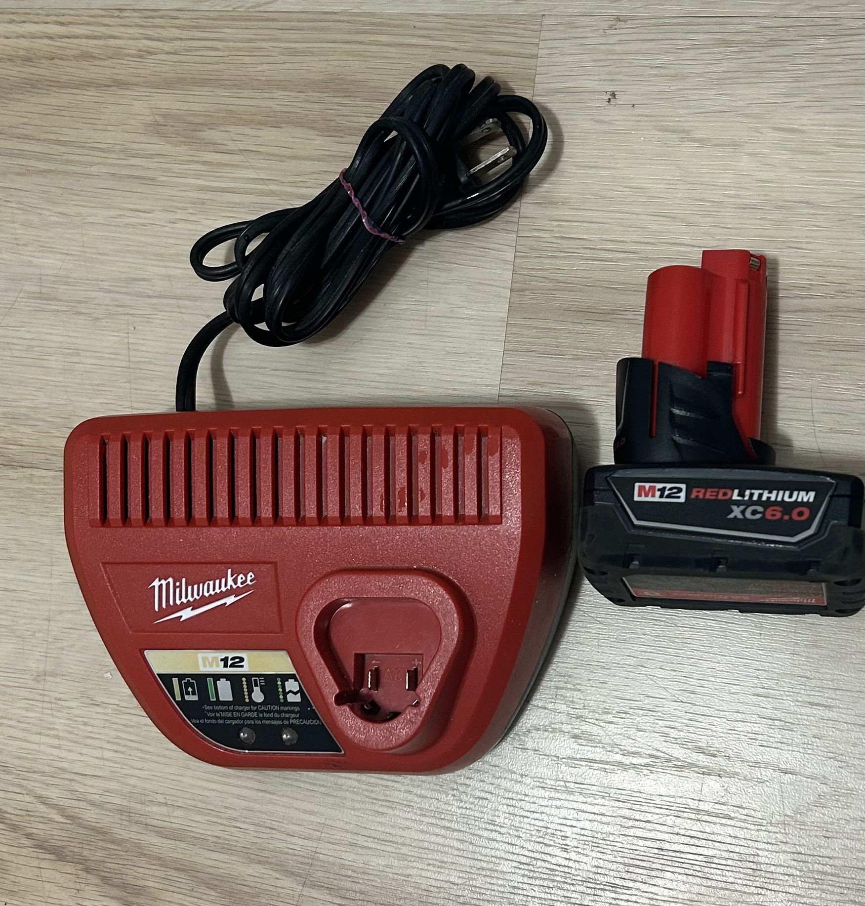 Milwaukee Battery And Charger