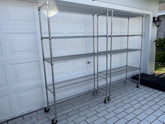 Metal shelf- shelves with wheels , 5 adjustable levels . $135 each . $250 for both. H77xW48xDeep18”