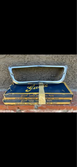 1960 Chevy Lamp Bezel NOS