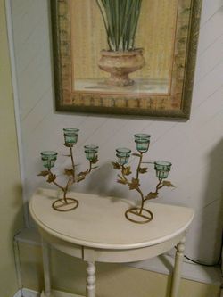 Set of two gold candle holders