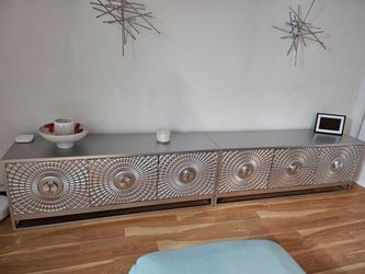 Low-Profile Silver Sideboard with Decorative Doors