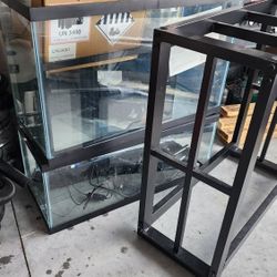 three fish tanks 10, 20 long, and 20 high and table