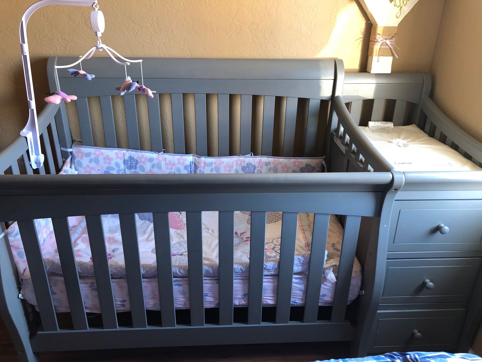 Crib with changing table and drawers attached