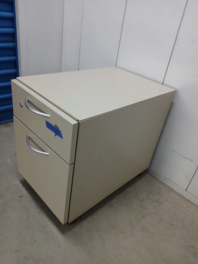 Metal File Cabinet On Casters In Good Condition