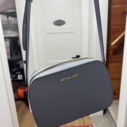 Michael kors light blue cross body