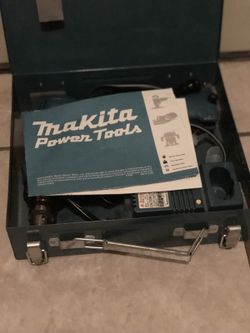 Makita cordless Drill Model 6093 d with charger and metal case