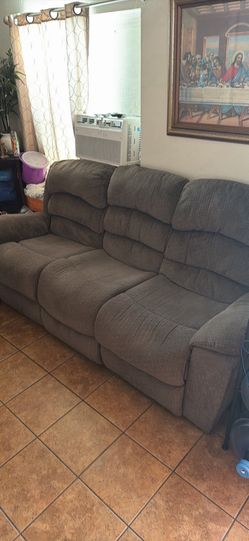 Grey reclining sofa