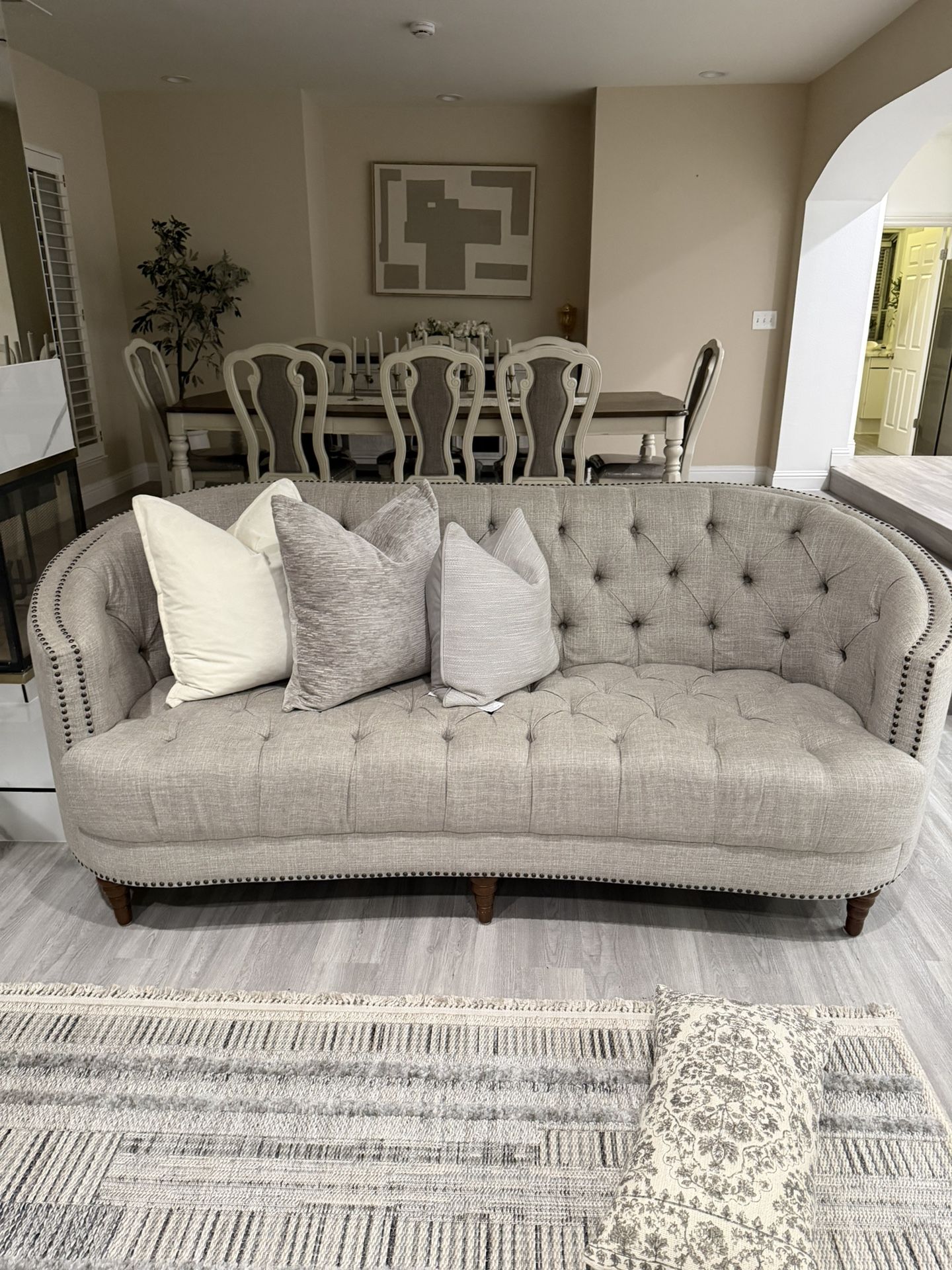classic sofa features rounded back softly surrounds a thick, plush, padded seat to form a striking design that's simply divine. Beautiful, beige uphol