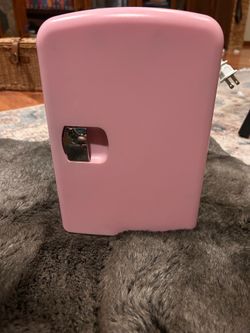 Pink mini fridge