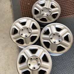 4 used factory 16 inch Jeep Rims