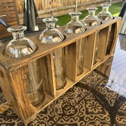 Wooden Display with Glass Bottles