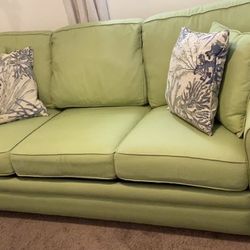 Green couch that turns into a sectional full-size bed