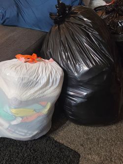 Bags of clothes and blankets