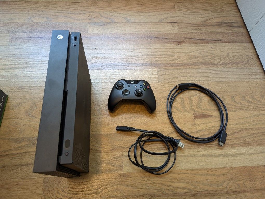 Xbox One X 1TB with Turtle Beaches Headset + Games