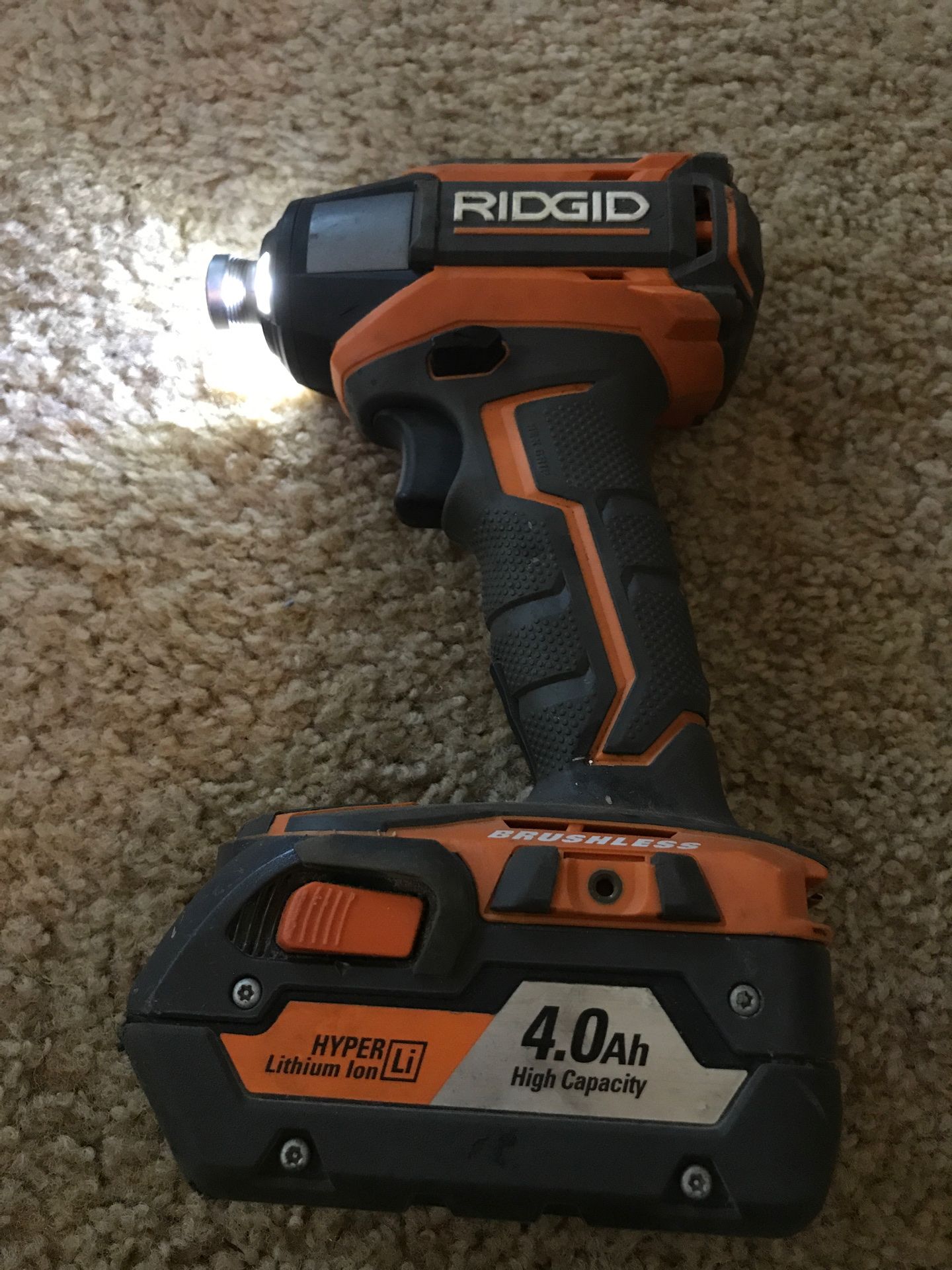 Strong-Running Lightly Used Ridgid Gen5X Brushless Impact Driver with 4.0Ah Battery and Charger.
